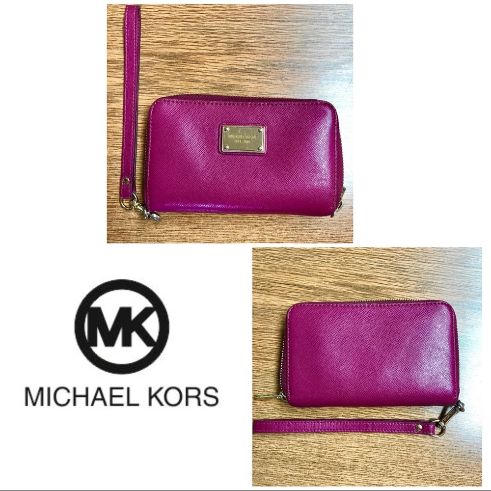 Michael Kors plum wallet .
